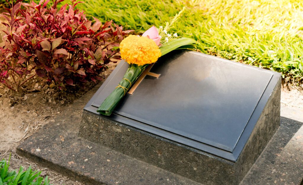 Cemetery Headstone with Flowers
